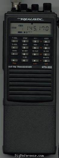 A black rectangular walkie-talkie style radio branded 'realistic' under its LCD screen, which shows that it is tuned to 145.17 Megahertz.