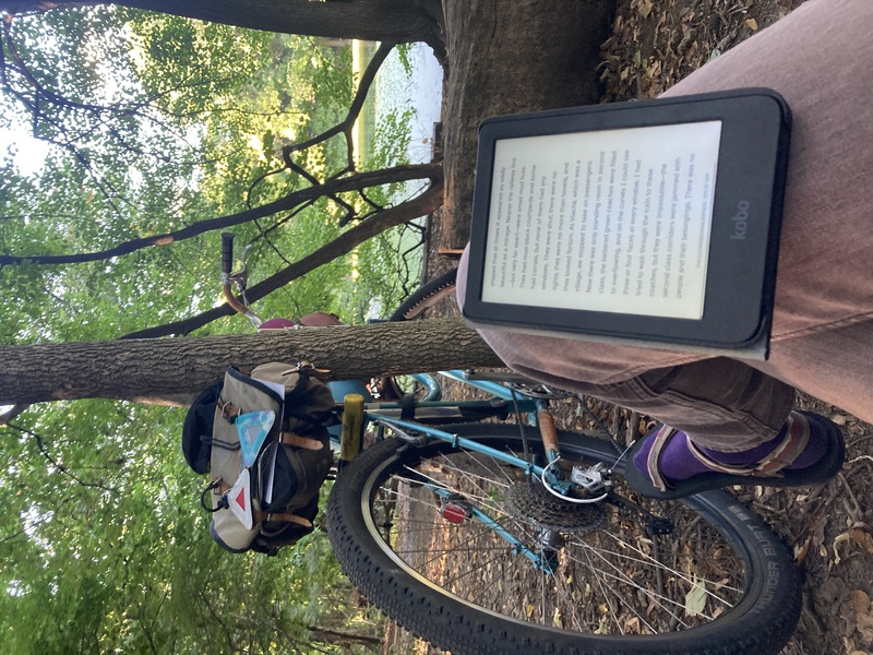 Kobo Clara BW eReader and bike in the park 