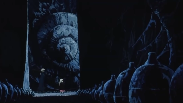 Screenshot from Angel’s Egg: the main characters walk past a hall lined with jars