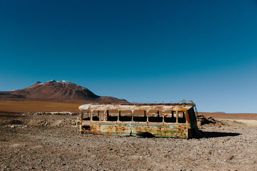 An abandoned bus in the Atacama desert outside of the oasis town of San Pedro de Atacama